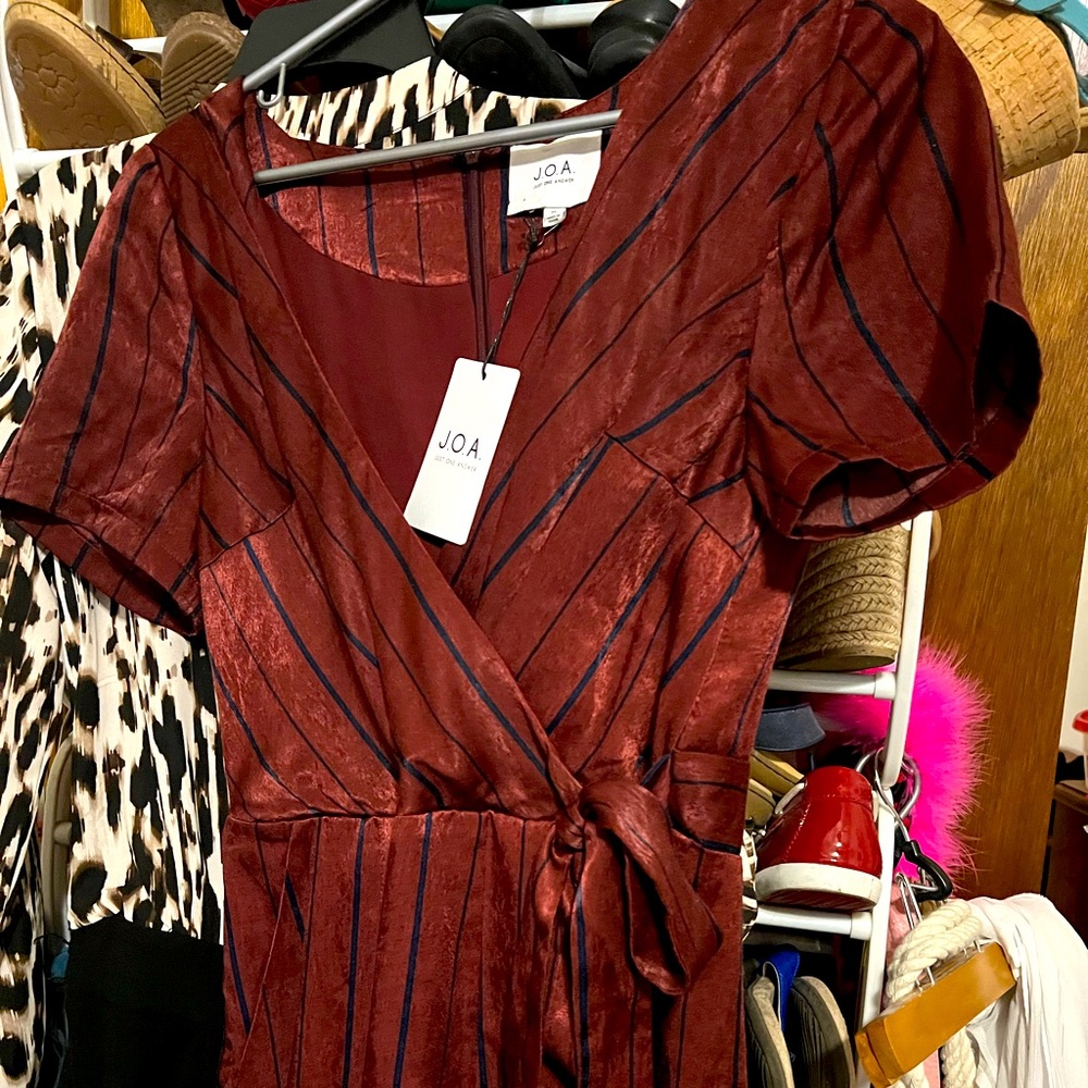 Beautiful brand new Jumpsuit. It’s a pretty Burgundy and Navy in color. - Picture 1 of 5